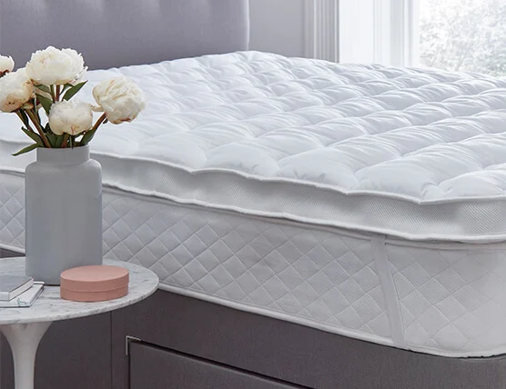 Mattress topper on a bed