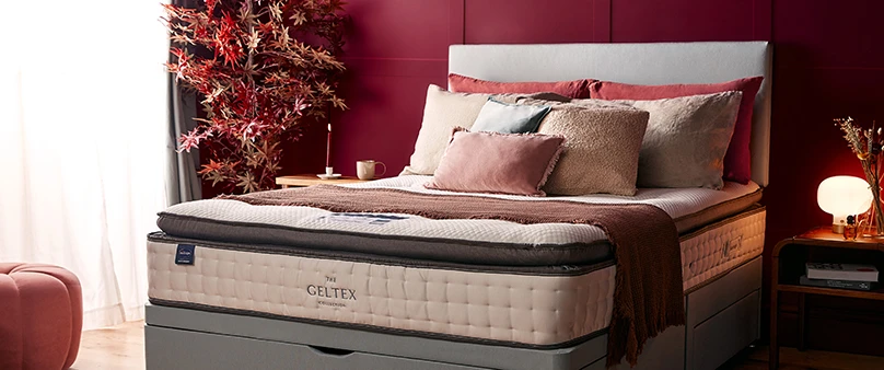 semi dressed bed in autumnal bedroom