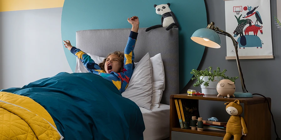 Child waking up in her bedroom