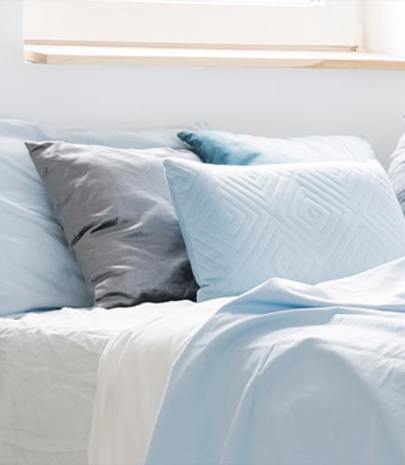 A bed with pastel blue colours - What colour should my bedroom be? 