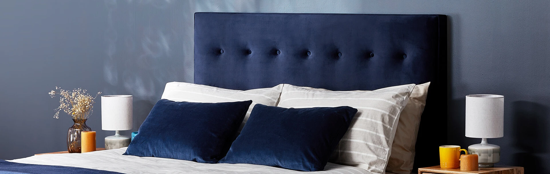 Headboard on divan base in maritime blue