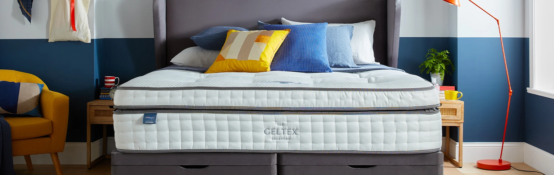bedroom with a geltex mattress in the middle and pillows on top
