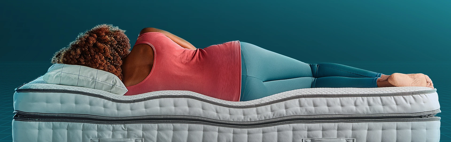 woman laying on mattress showing spinal alignment 