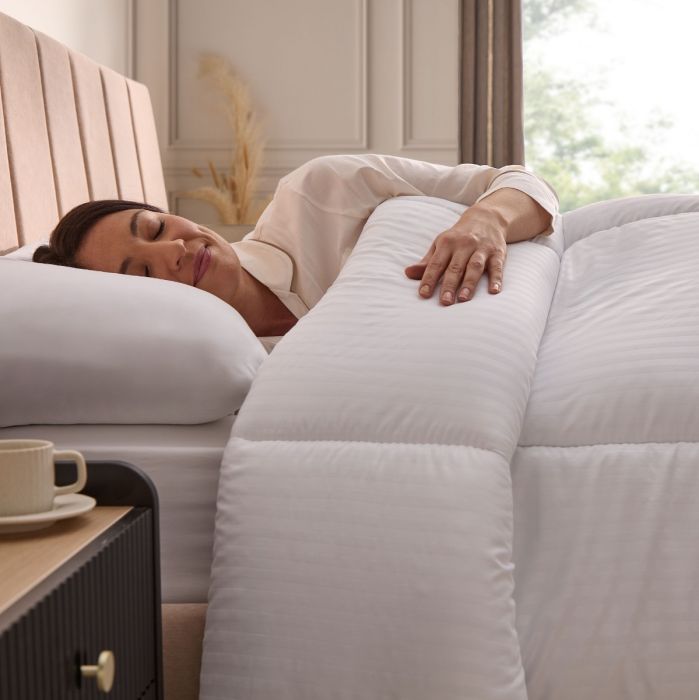 person sleeping in a silentnight hotel collection duvet