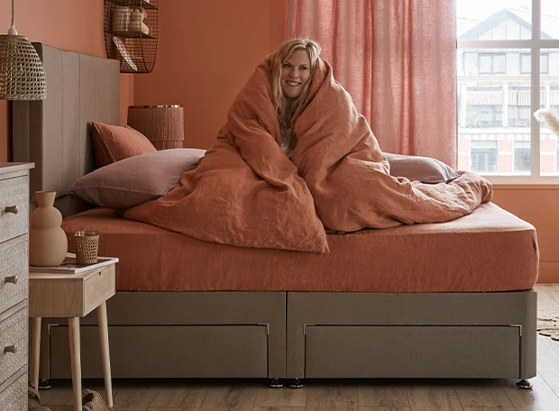 Sink-in snoozer sat on memory mattress