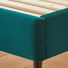 Octavia bed frame in peacock smooth velvet