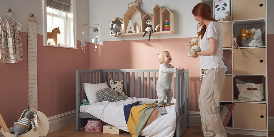 Mother and baby in a nursery