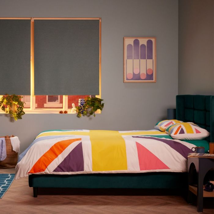 union jack bedding on a green bed