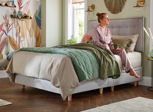 Woman sits on an eco comfort breathe mattress