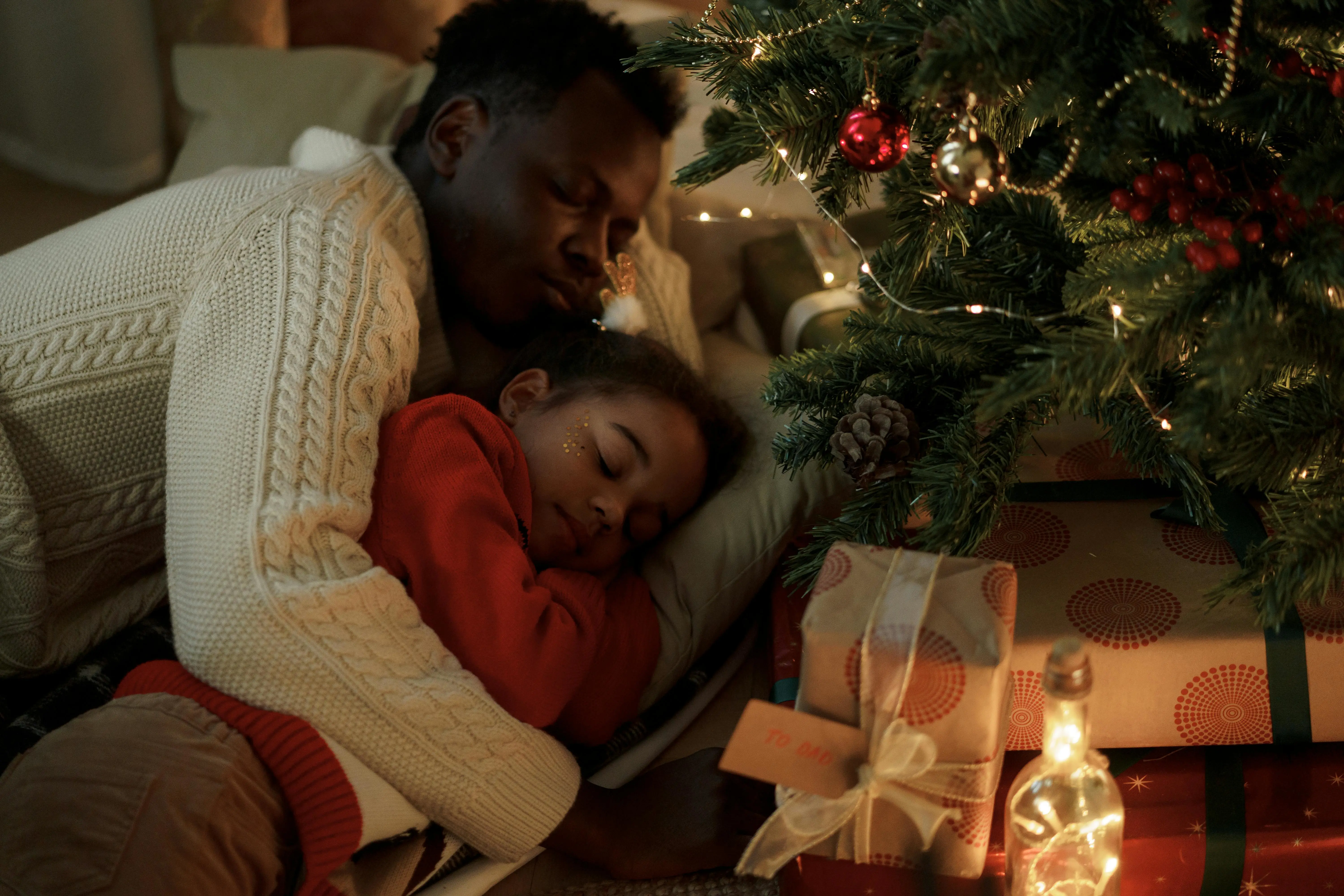 an image of a cozy christmas morning with family